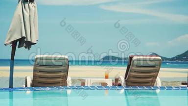 在苏梅岛附近有日光浴和鸡尾酒的游泳池。 假期概念。 3840x2160